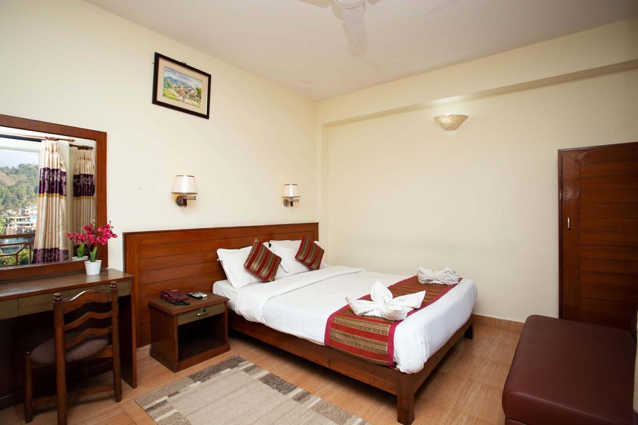 Hotel Orchid Покхара Экстерьер фото